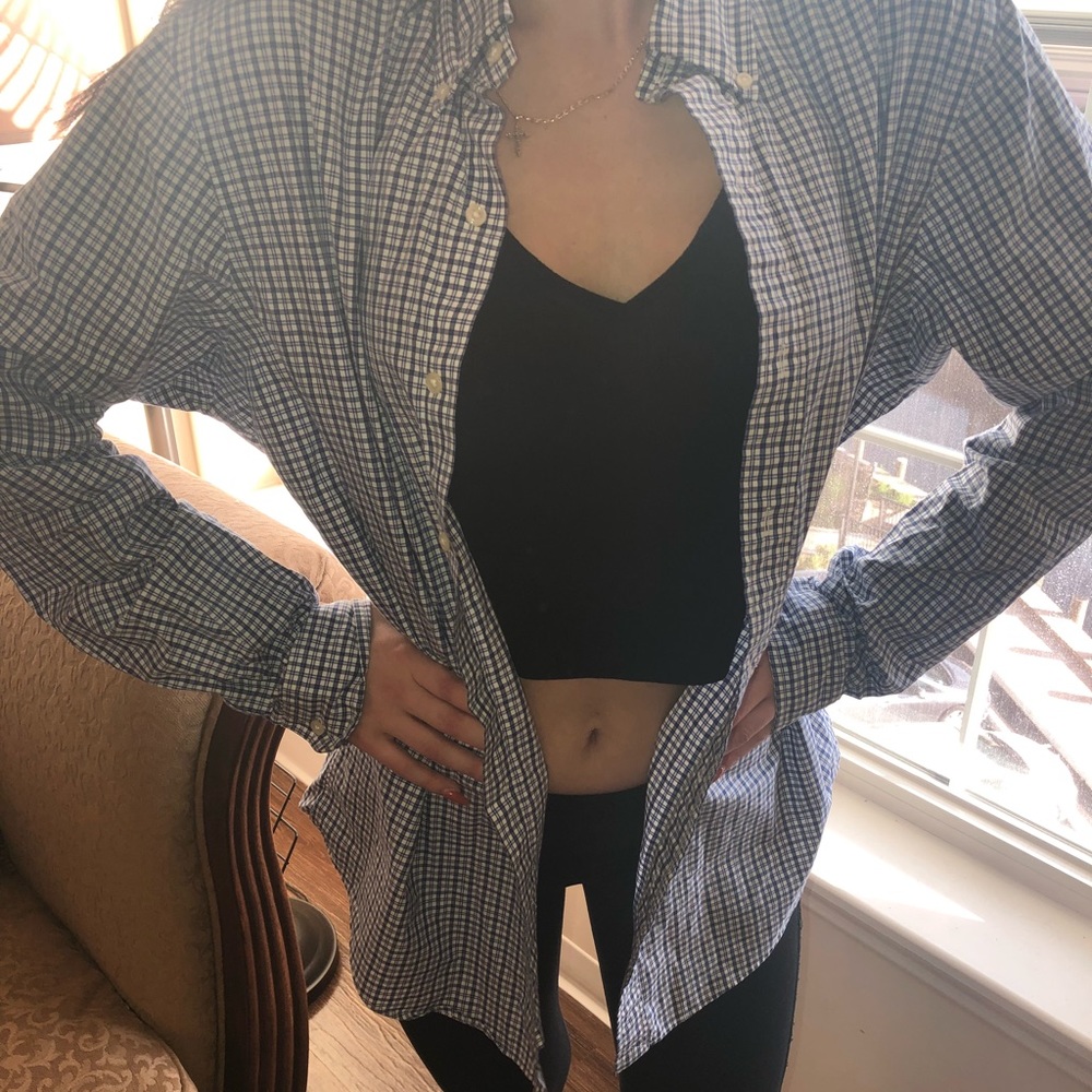 Plaid, long sleeve button down top.